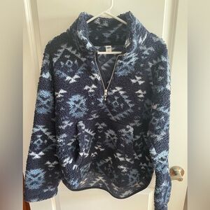 Woman’s old navy blue Sherpa pullover